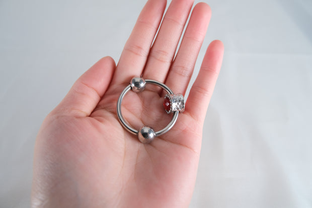 Artificial Ruby Cock Ring With Movable Two Pressure Ball