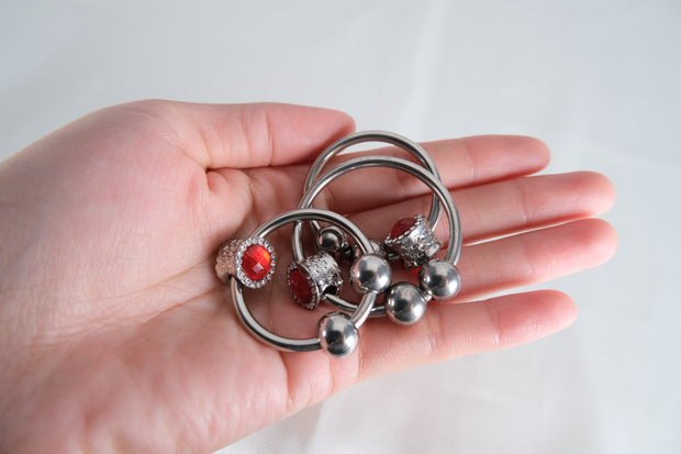 Artificial Ruby Cock Ring With Movable Two Pressure Ball