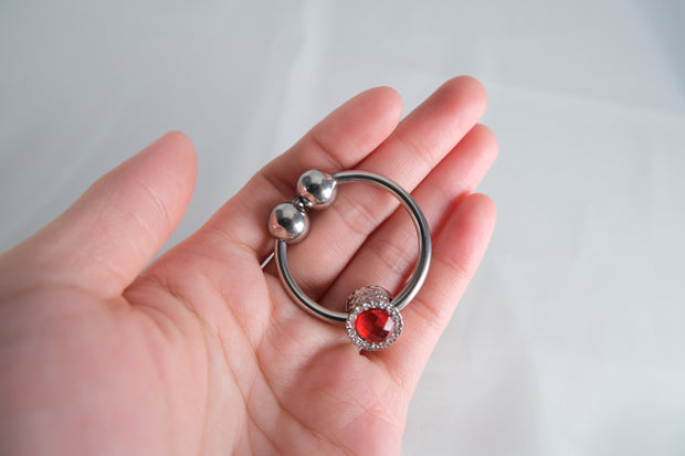 Artificial Ruby Cock Ring With Movable Two Pressure Ball