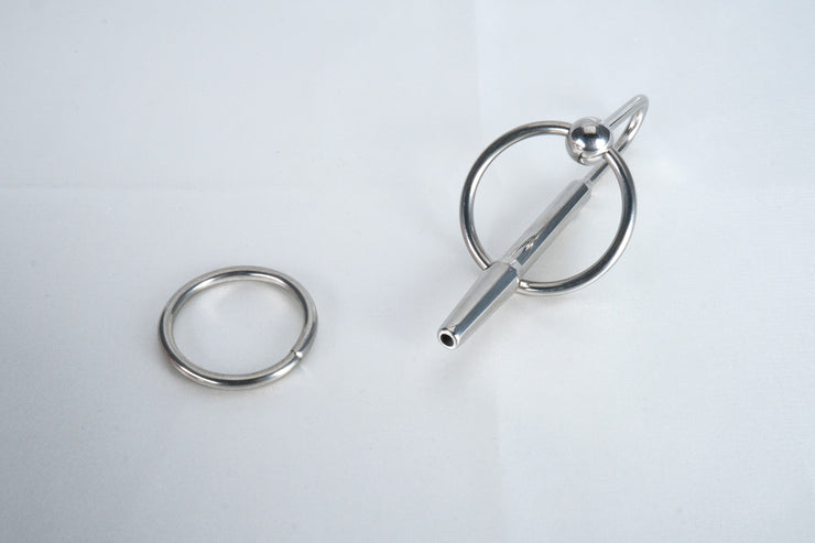 URETHRAL SOUNDS THROUGH HOLE PLUG