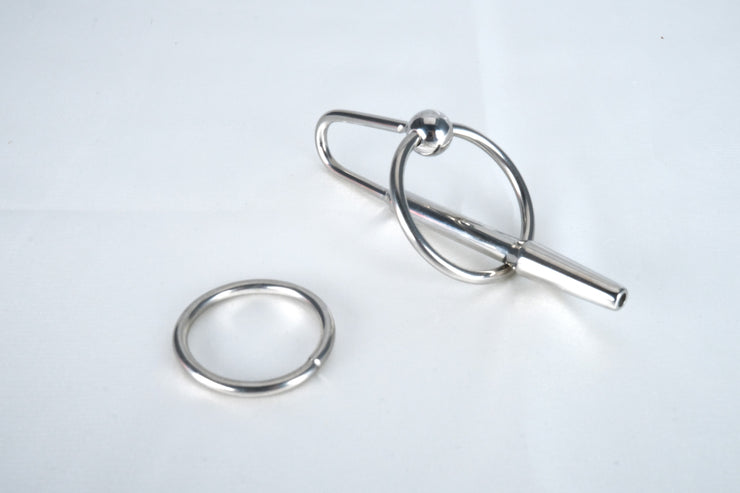 URETHRAL SOUNDS THROUGH HOLE PLUG